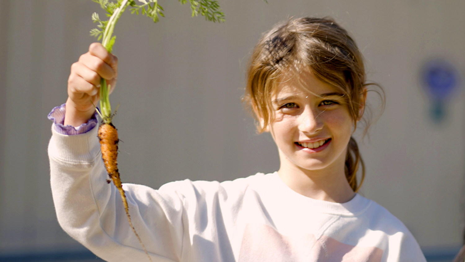 student with carrot